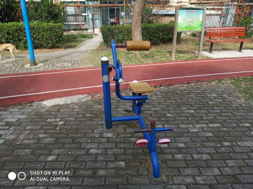 伸背機